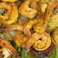 Camarones A La Plancha Platter · 8 grilled jumbo shrimp with bell peppers and onions. Served with 2 choice rice and salad or ...