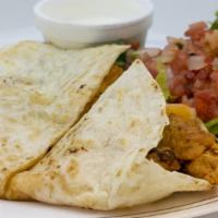 Chicken Breast Quesadilla · Served with homemade sour cream and house salad.