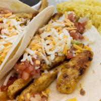 Chicken Breast Tacos (2) · with two sides.