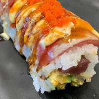 Cs15. Torch Tuna Maki · Raw fish. Tuna avocado roll topped with tuna then torch with spicy mayo, finish the roll wit...