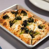 White Pizza · charred broccoli, lemon ricotta, roasted garlic crema- vegetarian