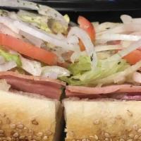 Italian Hoagie · Provolone Cheese, Capicola, Genoa Salami and Pepper ham with Lettuce, Tomatoes and Raw onion...