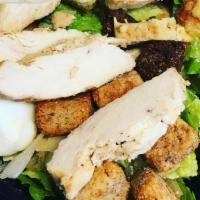 Chicken Caesar Salad · Romaine, grated Parmesan, croutons and egg halves topped with grilled chicken.