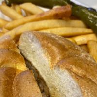 Chubby'S Pulled Pork Special Sandwich · Sharp provolone and long hots served on a Kaiser roll  with French fries.