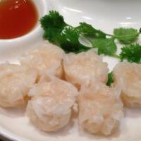 Shrimp Shumai (6) · Steamed shrimp dumplings served with a soy dipping sauce.