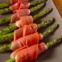 Salmon Asparagus · Six asparagus stalks rolled with sliced salmon and grilled to perfection.