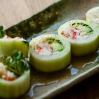 Kani Su · Crab and avocado rolled in fresh crispy cucumber with sauce.