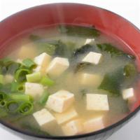 Miso Soup · Traditional vegetarian soup in a healthy soybean base with tofu, seaweed and scallions.