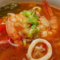 Spicy Seafood Soup · Fish, scallop, shrimp, fish cake with clear broth.