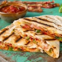 Veggie Quesadilla · Spinach, mushroom, green and red peppers, squash, zucchini, mozzarella cheese. Served with f...