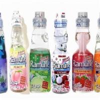 Ramune Japanese Soda - Grape Flavored · Popular Japanese carbonated soft drink made of glass and sealed with a marble.
