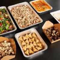 Mediterranean Meal · Group meal feeds 20 guest 
.Full tray chicken shawarma 
.Full tray Greek salad 
.Half tray H...