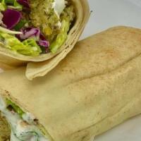 Falafel Pita · Fresh parsley, cilantro falafel, cooked to order served with hummus, cucumber, tomato and ta...