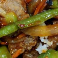 Beef With Mixed Vegetables · Served with rice.