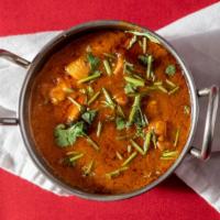 Chicken Curry · Traditional Mughlai offering. Boneless chicken cooked in heavenly curry sauce, seasoned to y...