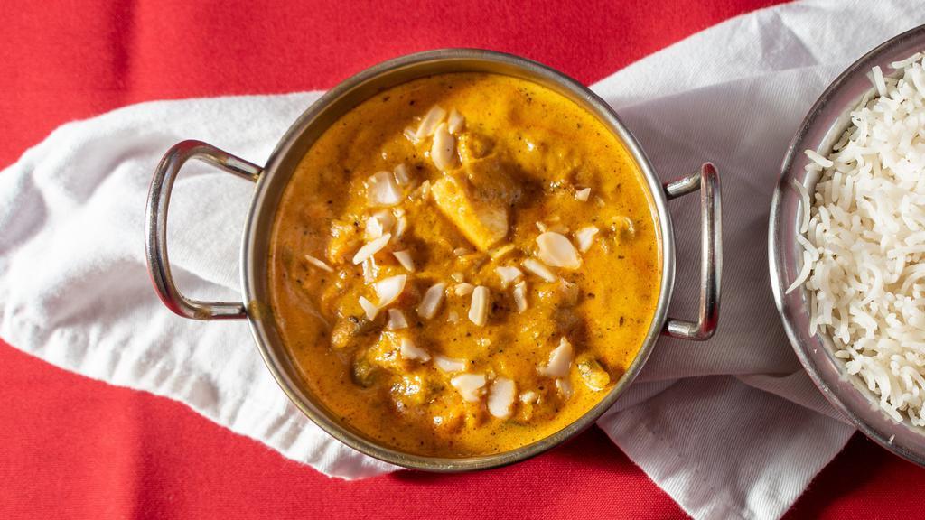 Navratan Korma · Vegetarian. A medley of 9 vegetables cooked with mild creamy sauce topped with cashews and raisins.