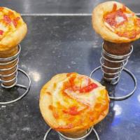 Pepperoni Pizza Cone · Hot and Delicious  pizza crust filled with cheese, pepperoni and pizza sauce.