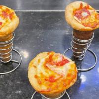 Pepperoni & Sausage Pizza Cone · Hot and Delicious  pizza crust filled with cheese, pepperoni, sausage and pizza sauce.