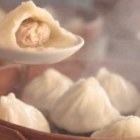 Pork Soup Dumplings (6) 灌汤小笼包 · known as Xiaolongbao. Each steamed dumpling consisting of a paper thin wrapper enveloping a ...