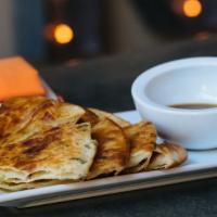 Scallion Pancakes · flaky pancake layered with scallions - vegetarian - spice: 0 out of 5