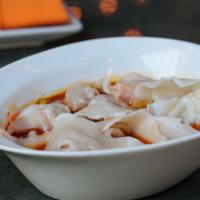 Pork Wontons In Chili Oil (8Pc) · pork-filled wontons in a black vinegar & chili oil sauce - spice: 3 out of 5