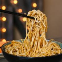 Dan Dan Noodles · pork-filled dumplings in a sweet soy & chili oil sauce - spice: 3 out of 5