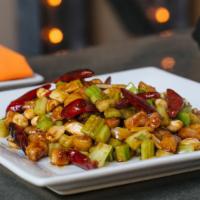 Kung Pao Dish · cooked in a flaming wok with Kung Pao sauce, peanuts, celery, and dry chili peppers - spice:...
