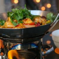 Dry Pot Dish · served in a sizzling mini wok and cooked in a spicy hot pot sauce with black mushrooms, bamb...