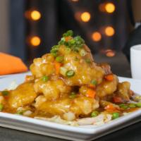 Lychee Fish · flounder fillets lightly battered and fried, served with our house-made sweet and sour sauce...