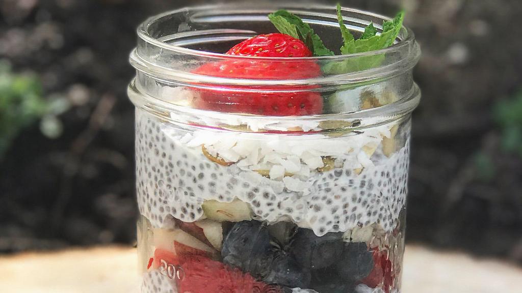 Chia Pudding Parfait · Flavored with vanilla and maple syrup and layered with fresh berries, pears, toasted coconut and assorted nuts.