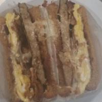 Egg With Meat Sandwich · Served on buttered toast.