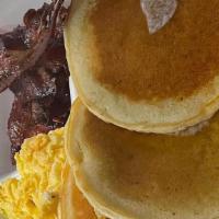 3 Pancakes Or 3 French Toast & Meat · Add eggs for an additional charge