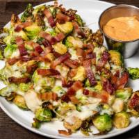 Fried Brussels Sprouts · Bacon, mozzarella, aioli sauce.