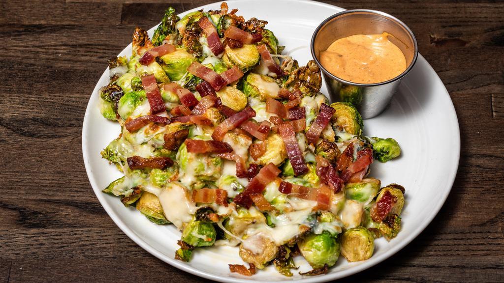 Fried Brussels Sprouts · Bacon, mozzarella, aioli sauce.