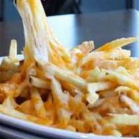 Blake'S Cheese Fries · Our famous fries topped with Monterey Jack and Cheddar cheese. Ranch dressing on the side fo...