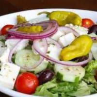 Greek Salad · Feta cheese, red onions, Kalamata olives and pepperoncini, served on a bed of mixed greens w...