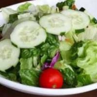 Tossed Salad · Tomatoes, cucumbers and carrots served on a bed of mixed greens. Healthy menu item.