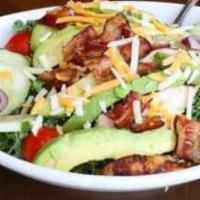 California Chicken Salad · Fresh chopped kale topped with a grilled chicken breast, bacon, cucumber, tomato, red onion,...