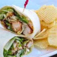 Chicken Caesar Wrap · Grilled chicken breast, Parmesan cheese, crisp romaine lettuce and Caesar dressing, wrapped ...