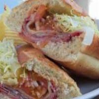 Hot Italian Sub · A meat-packed sub filled with capicola ham, Genoa salami, provolone cheese and Italian dress...