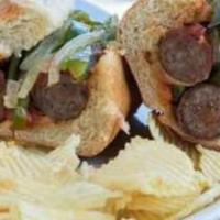 Italian Sausage Sub · Mild Italian sausage smothered with lots of onions and peppers. Topped with with our famous ...
