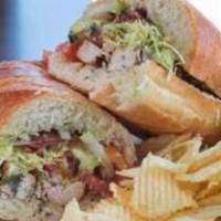 California Chicken Sub · Grilled chicken breast topped with bacon, avocado, red onion, lettuce, tomato, cucumber and ...