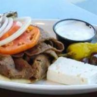 Gyro Sub · Combination of beef and lamb served on a pita with tomato, onion, feta cheese and tzatziki s...