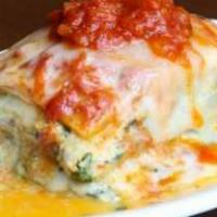 Spinach Lasagna · A homemade house specialty. Pasta layered with fresh spinach, marinara sauce and a special b...