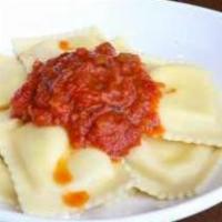 Kids Cheese Ravioli · Filled with ricotta cheese and smothered with our marinara sauce. served with homemade garli...