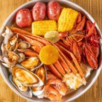  🌊🦀Seafood Platter (Large) · Snow crab whole shrimp crawfish mussels clams corn and potatoes.