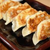 Gyoza · Fried pork dumpling.