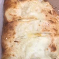 Special Stromboli (Large) · Steak, pepperoni, salami, sauces, green peppers, fried onions, mushrooms, olives and mozzare...