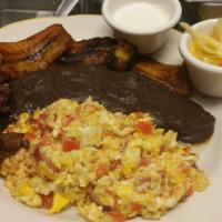 Desayunos / Breakfast · Huevos, frijoles platanitos, crema ácida, queso guatemalteco, y tortillas / Eggs, black refr...