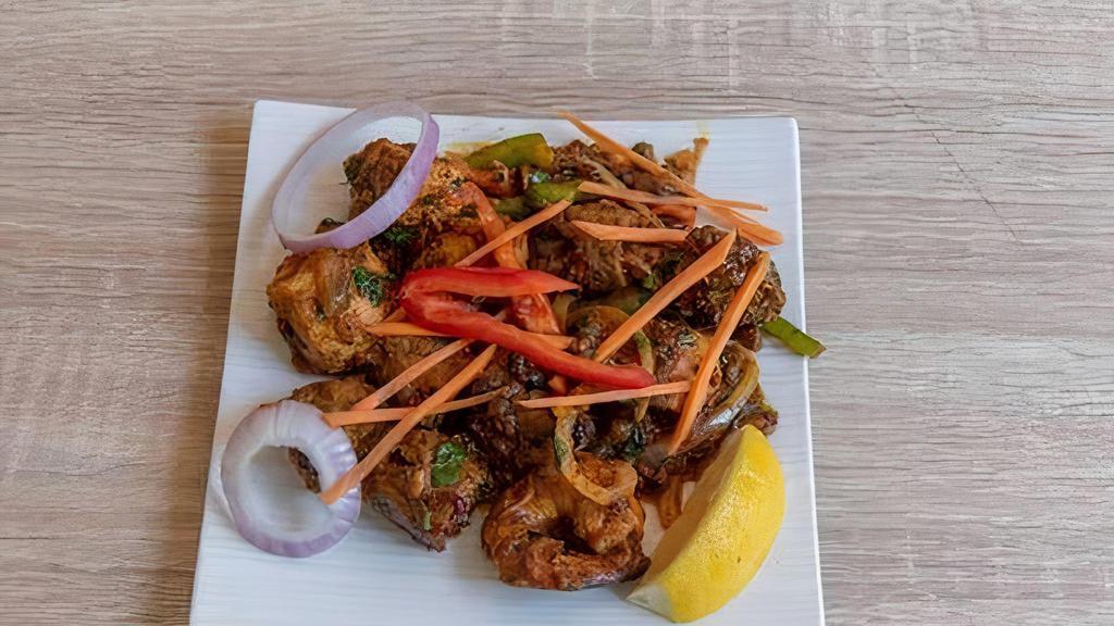 Signature Kabab Platter · Gluten-free. Chicken tikka, mahi tikka, lamb seekh, shrimp and chefs signature sauce.